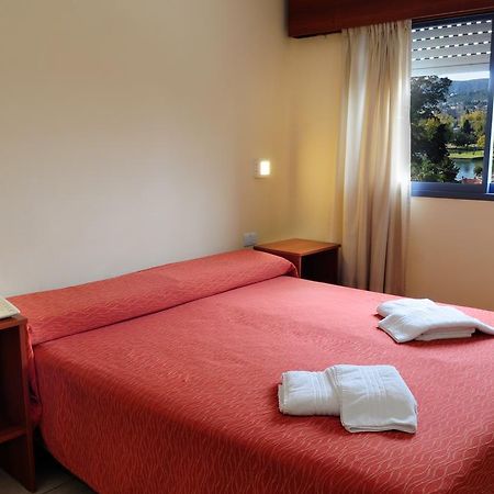 Hotel Temu Villa Carlos Paz Bagian luar foto