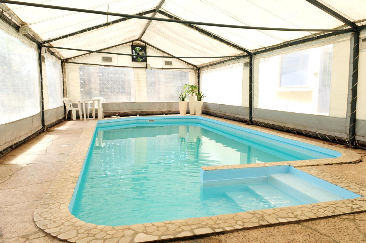 Hotel Temu Villa Carlos Paz Bagian luar foto